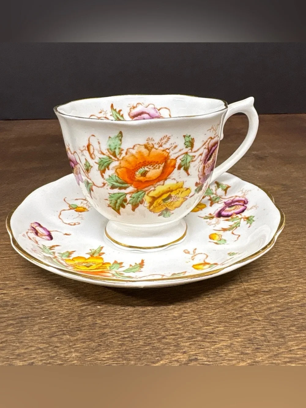 Royal Albert White Teacup and Saucer with Orange, Yellow, Pink Floral Design